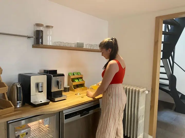 Equipped kitchen with coffee machines at Panda Coworking