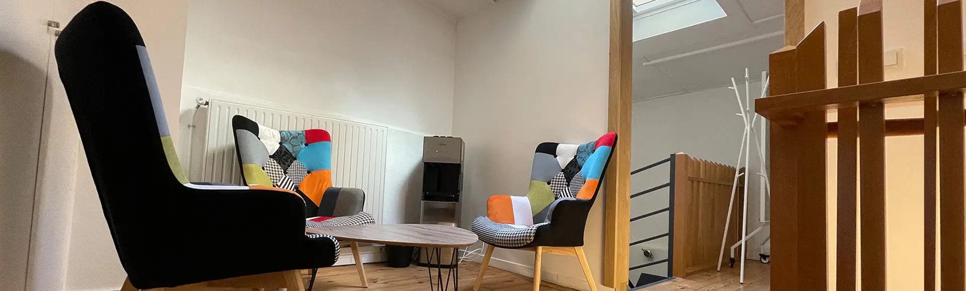 Lounge area with armchairs at Panda Coworking